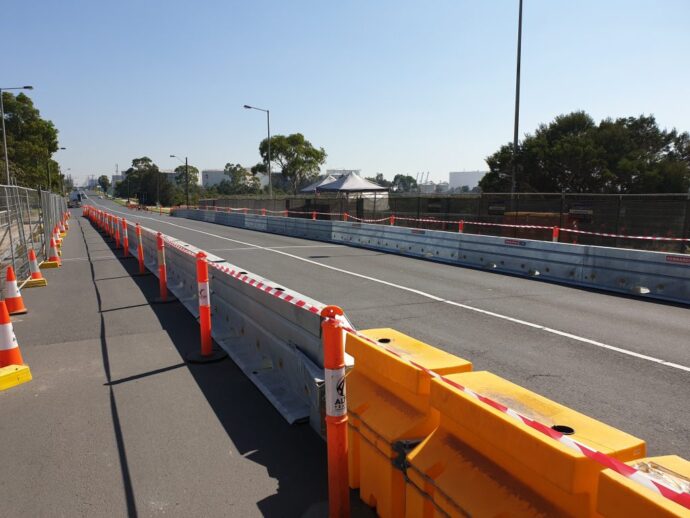How Do Water-Filled Barriers Compare Concrete Jersey Barriers?
